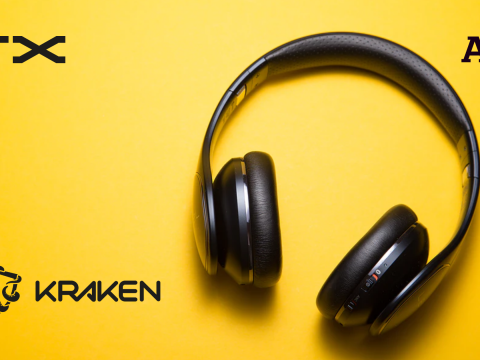 headphones on a yellow blackground woth KRAKEN Atos and TX logos